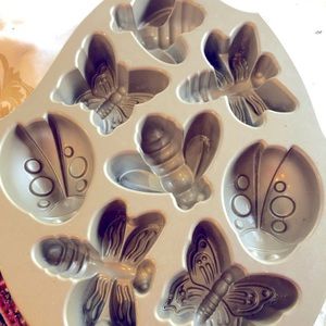 Coated muffin pan for kids parties with ladybugs,